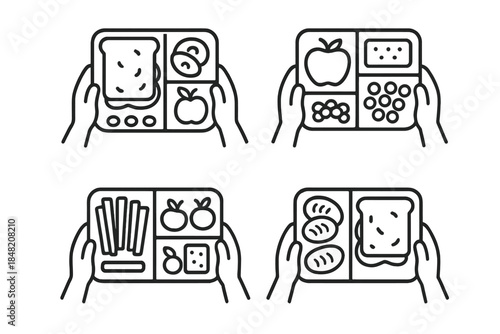 Four Lunch Boxes Filled with Food