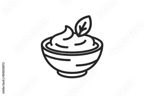 Creamy dip with a leaf in a bowl icon