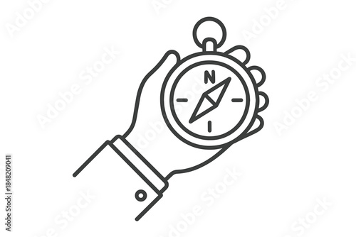 Hand holding a compass