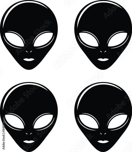 Four Black Alien Faces With Large Eyes And Smiles extraterrestrial