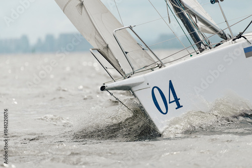 Photos bow of a sailing boat with bowsprit at sailing regatta in the Gulf of Finland at