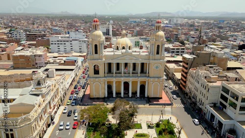 Aerial view of Chiclayo’s Main Square featuring the Cathedral of Saint Mary of Chiclayo, landscaped gardens, central walkways, and active urban life surrounding this iconic landmark in northern Peru
