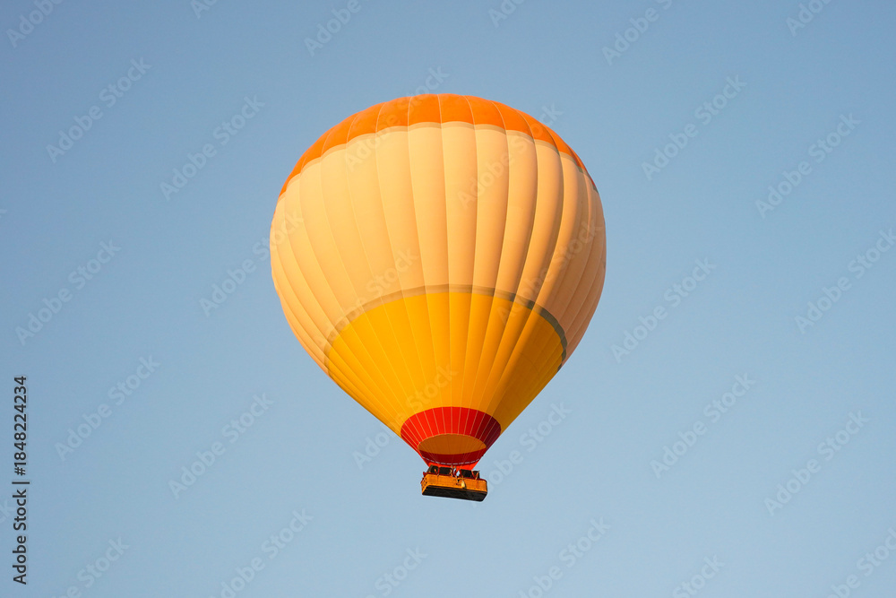 Obraz premium Hot Air Balloon over Cappadocia Valleys in Nevsehir, Turkiye