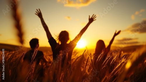 Joyful celebration of life sunrise in a field group of friends natural environment silhouettes embracing freedom and happiness