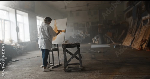 Wallpaper Mural Female artist painting on canvas in art studio Torontodigital.ca
