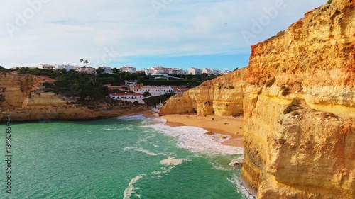 Benagil Beach, Cliffs and Atlantic Ocean on Sunny Day. Drone Shot. Algarve, Portugal. Moving Forward