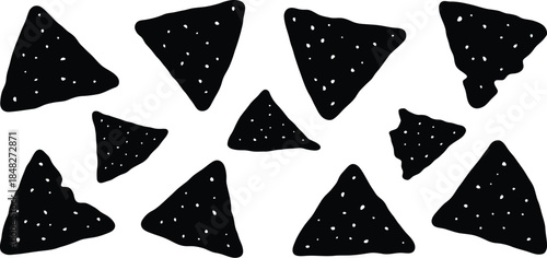 Black tortilla chips scattered randomly a delightful snack on transparent background silhouette