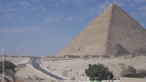 Cairo,Egypt - December 5, 2025: Tourists Walking on Giza pyramid complex