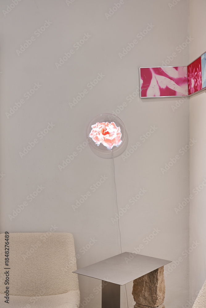 Naklejka premium Calm Cozy Setting, Charming Workspace Featuring Soft Pink Lighting And Comfortable Furniture