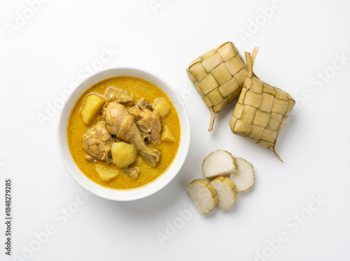 Top View Flat Lay of Indonesian Ketupat and Opor Ayam Festive Dish