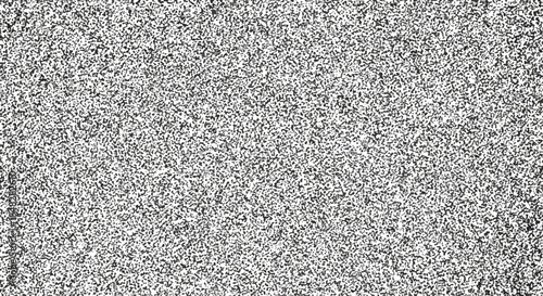 Abstract monochrome speckled texture background for graphic design, digital noise pattern, seamless gradient effect.