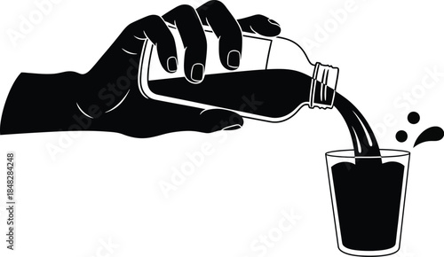 A hand pouring a dark liquid from a bottle into a glass