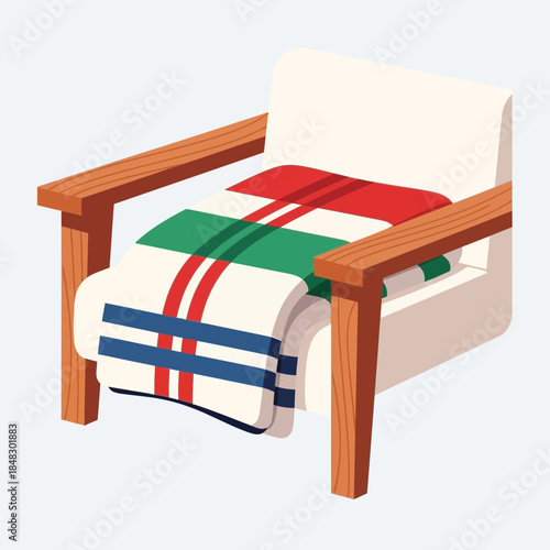 Comfortable armchair with a throw blanket and colorful cushions for cozy relaxation