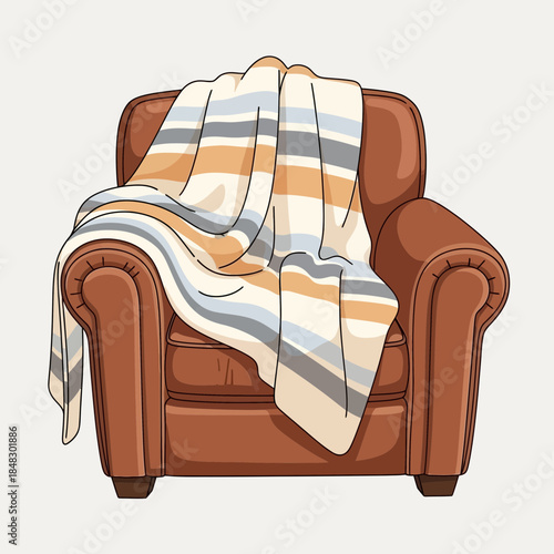 Cozy Armchair with a Comfortable Striped Throw Blanket Draped Over It for Relaxation
