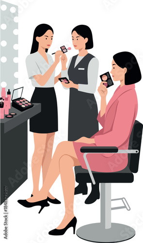 Makeup Artist Applying Makeup To Woman In Pink Robe