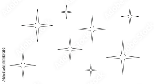 Set of minimalist black and white sparkle and star icons, featuring clean four-pointed shapes for highlighting magical effects.