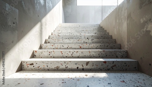 A lowangle view of a terrazzo staircase with strong sunlight casting a diagonal shadow across the steps and concrete walls