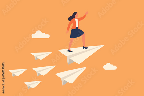 Business leadership, woman power to lead company to achieve target, smart confidence businesswoman standing on leading flying paper airplane origami pointing finger to the direction to reach goal.