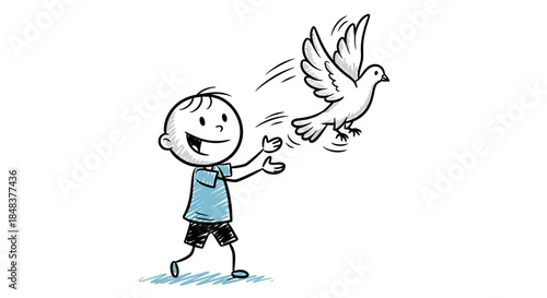 Joyful boy releases a white dove into the bright blue sky.