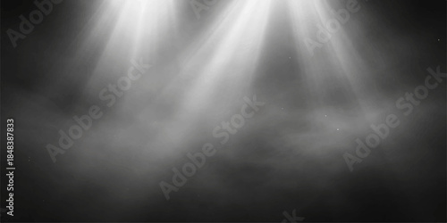 Abstract background with light rays reflecting off a shiny brushed aluminum metal texture featuring a dark silver chrome surface and subtle smoke patterns under a metallic spotlight