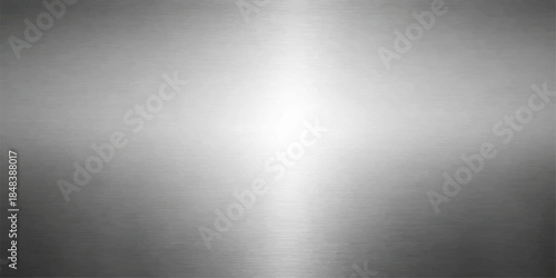 Polished silver brushed metal plate texture features a shiny stainless steel surface with a light metallic gray pattern and reflective chrome finish for a sleek industrial aluminum backdrop design