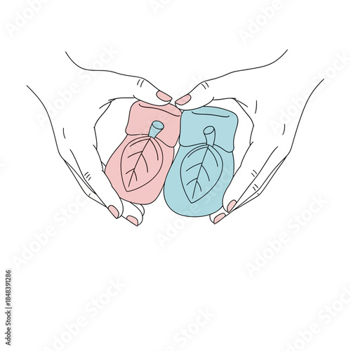 Hands cradling baby booties symbolizing gender reveal and new life.