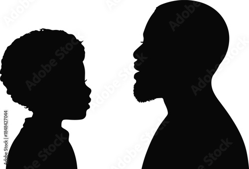 Silhouettes of child and adult facing each other showing generational bond, mentorship, and emotional connection in profile view