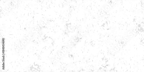 A textured grainy white background with subtle variations in tone and pattern