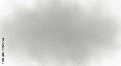 A soft, blurry, grayscale image with a cloudy or foggy texture.