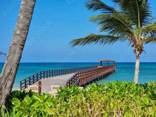A pier stretching far out to sea.