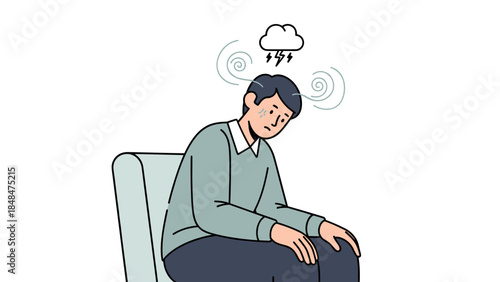 Sad young man sitting on couch with stress and anxiety cloud