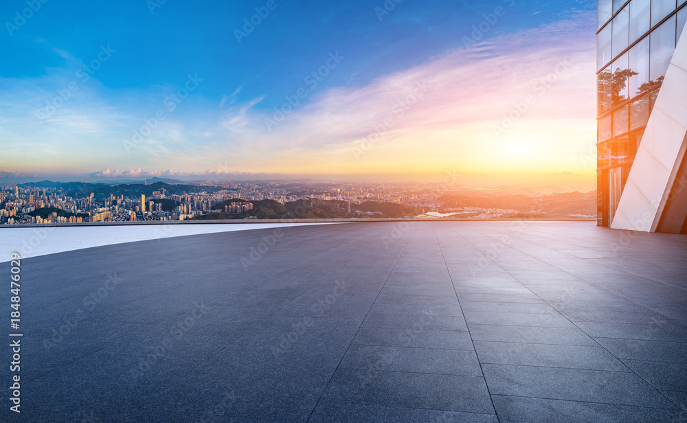 Obraz premium Empty square floor and modern city skyline with residential buildings at sunset in Shenzhen