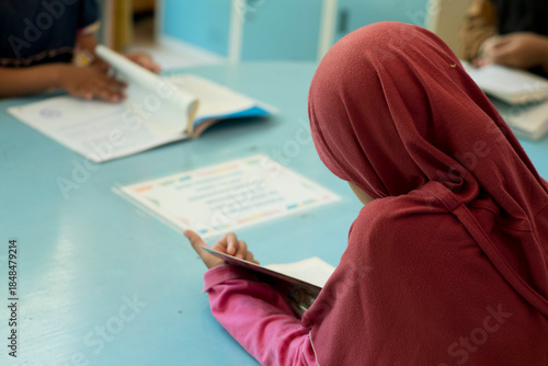 group of student reading a book