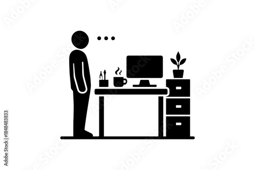 Minimalist office scene with person standing at desk