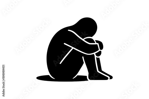 Silhouette of a person sitting in contemplation