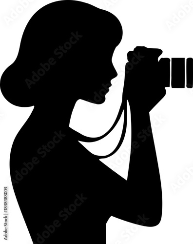 A silhouette of a woman taking a picture with a camera