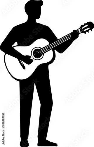 A silhouette of a man playing an acoustic guitar