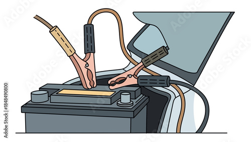 Car battery with jumper cables attached for charging
