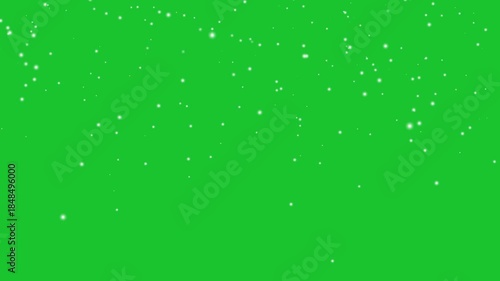 Animated realistic detailed very small snow flakes slowly falling densely against green skin background. Snowing Overlay Chroma Key Green Screen Alpha Channel. Looping Snowfall Particles