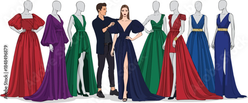 Fashion designer with models in elegant evening gowns.