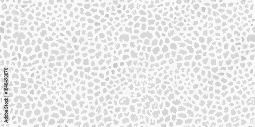 Subtle gray and white spotted pattern a seamless repeating background texture