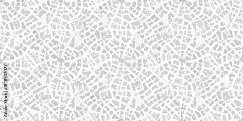 Intricate gray and white leaf pattern creating a seamless textured background