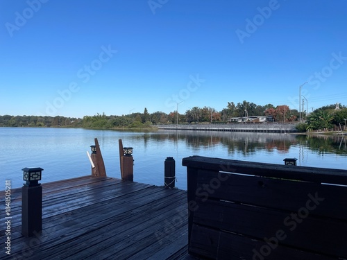 Lake Roy clear blue sky relaxing scene shady wooden deck area