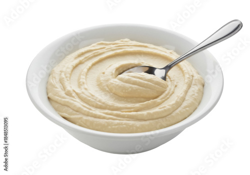 Tableau sur toile Creamy hummus in a bowl with spoon isolated PNG, Middle Eastern dip made from ch