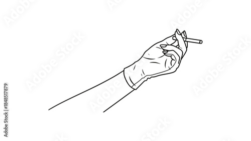 Woman's hand holding lit cigarette with red nails