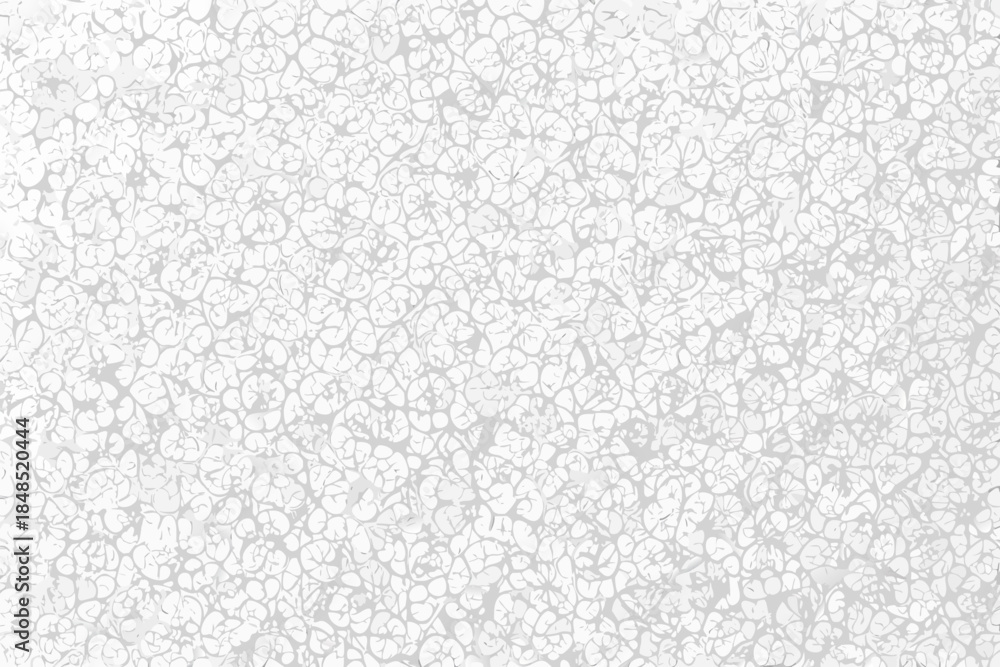 Obraz premium A densely patterned monochromatic background composed of many small swirling shapes