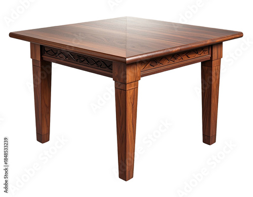 A square wooden table with carved detail on its apron