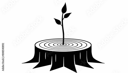 New life concept with a small plant growing from a tree stump, symbolizing rebirth and environmental renewal.