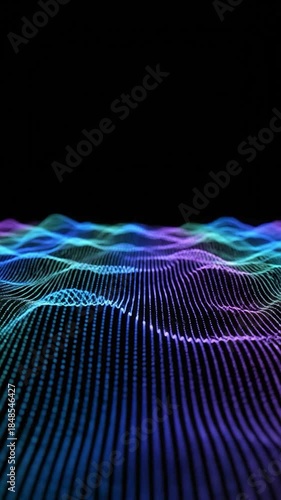 Glowing digital landscape of blue and purple particle waves on a black background
