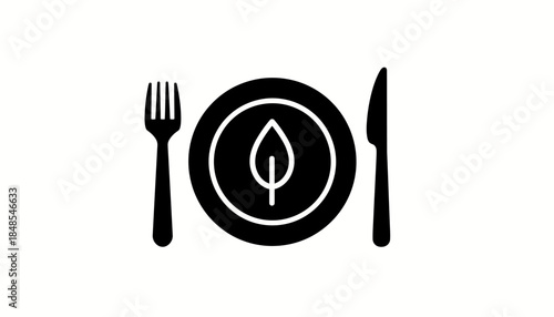Vegan food icon with plate, fork, knife, and leaf symbol representing healthy plant-based eating.